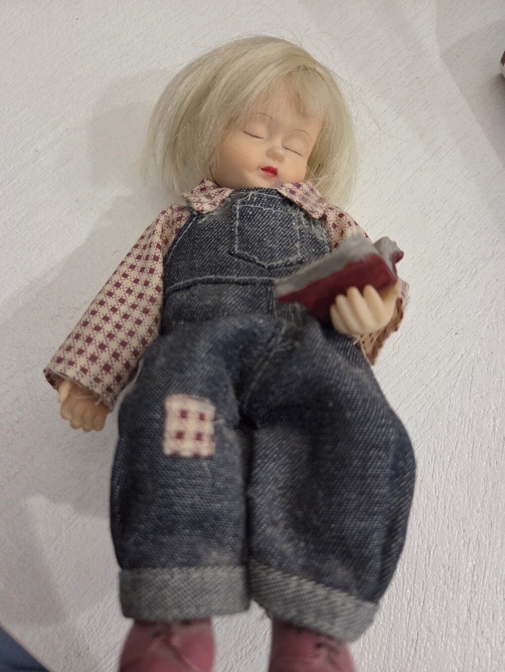 Napping Porcelain Blonde Girl Doll With A Book